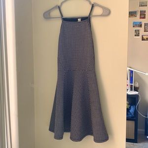 Black mini dress with white polka dots